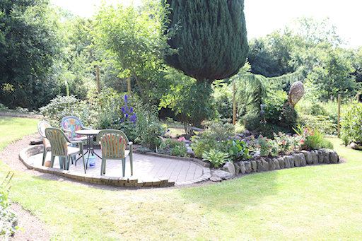 Somewhere to sit and contemplate the garden&copy;Ken Woolfenden
